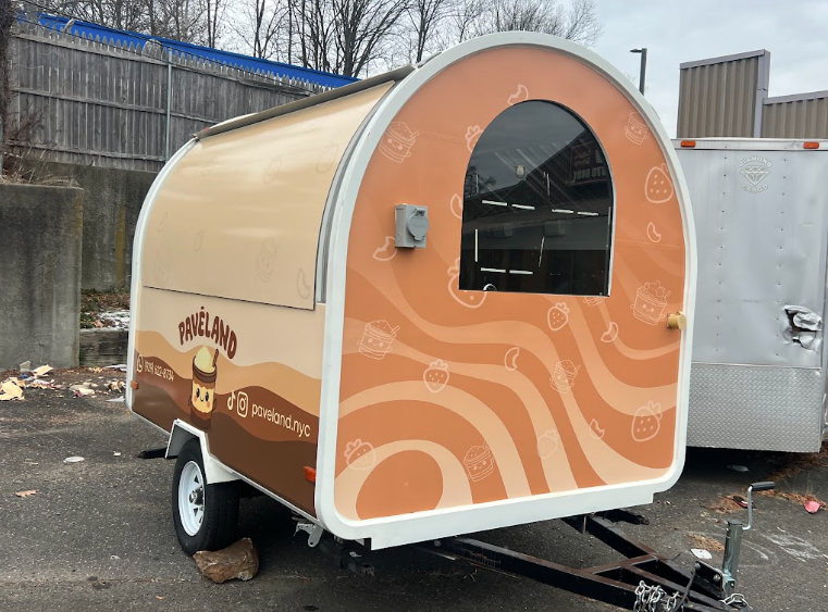 Camouflage vehicle wrap project in installation shop